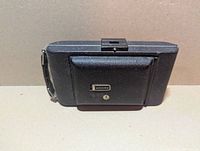 Camera closed showing exterior leatherette covering and Kodak badge