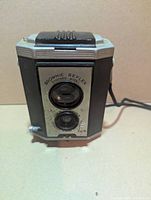 Front view showing twin lenses and faceplate markings