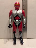 Front view of Galactic Man figure with ruler indicating approx 10 in height