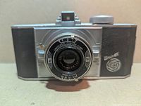 Front view of Univex Iris camera showing lens and branding