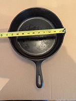 Top view with tape showing approximately 10.5-inch diameter