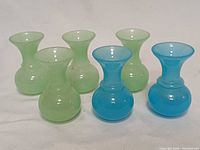 Six Peking glass mini vases, front view showing color and shape