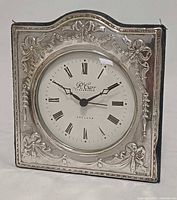 Front view showing sterling silver face and dial