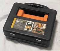 Closed carry case showing label CAP 10 lb pair dumbbells