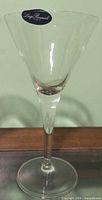 Single Luigi Bormioli crystal martini glass showing sticker and full view