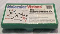 Front of sealed green case showing Molecular Visions label