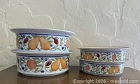 Stack of two deep and two shallow Dansk Fiance Fruits bowls showing exterior pattern