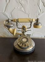 Front view of ITT French style rotary dial telephone