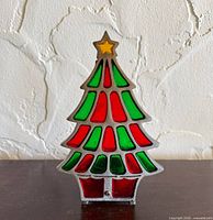 Front view showing stained glass colors and star detail