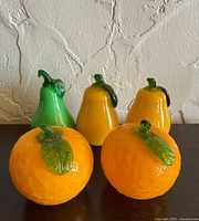 Front view showing all five Murano glass fruit figurines