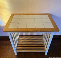 Full view of tile top table front angle