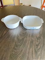Square and round CorningWare dishes side by side