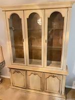 front view of complete cream wood china cabinet sideboard