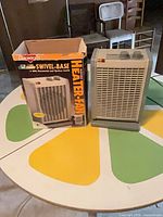 Heater-fan next to original box on table