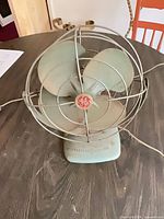 Front view showing GE medallion, blades, base