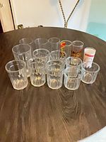 Group of all fifteen glasses on table