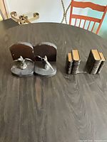 All four bookends on table