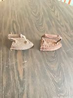 Both sad irons top view showing overall shape and condition