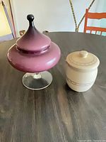 Both lidded pieces side by side showing overall forms and colors