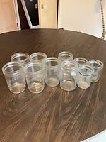 All 11 clear glass mason jars on tabletop