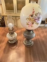 Both lamps side by side showing relative size and styles