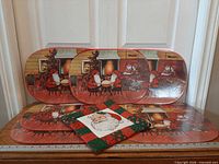 All seven placemats arranged with potholder in front