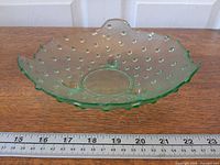 Top view showing hobnail pattern, round center and three feet placement