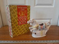 Cook book binder front and teapot left side