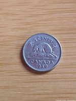 Reverse showing beaver, date 1938 and denomination 5 cents
