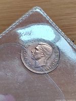 Obverse with King George VI portrait in sleeve