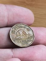 Reverse showing 5 CENTS CANADA 1942 beaver design