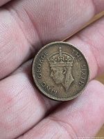 Obverse showing King George VI portrait and legend