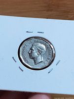 Obverse with King George VI inside cardboard flip