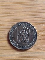 Obverse showing lion in shield and date