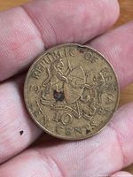 Reverse showing coat of arms and denomination