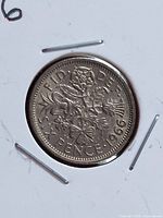 Reverse of 1966 sixpence showing crowned rose design and date