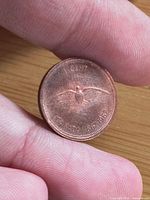 Reverse view showing rock dove design and date 1867-1967