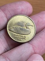 Obverse showing loon and "PRINTED IN MINNESOTA USA"