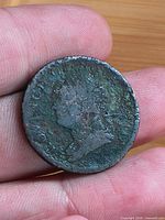 Obverse of worn George Nova Scotia penny token