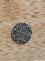 Obverse side showing letter A and Ontario Department of Highways legend