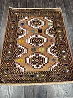 Full overhead view of entire rug showing pattern and fringe