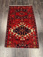 Full view of handmade Garajeh rug on floor