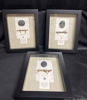 Three shadow boxes showing overall appearance