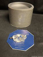 Figurine on certificate card with presentation box