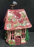 Front view of ceramic cottage tea light holder