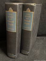 Front view of both volumes showing titles and editor