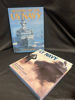 Front cover of both books showing titles and naval imagery