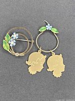 Brooch and pendant front view