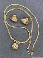 Front view of necklace and earrings