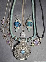 Front view of all sterling silver jewelry pieces laid out